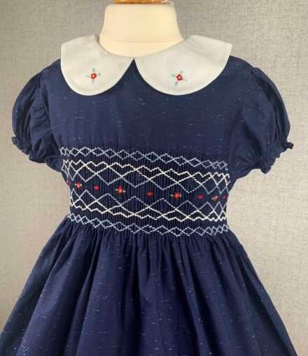 Girls Navy Blue Smocked Dress With White Dotted Print