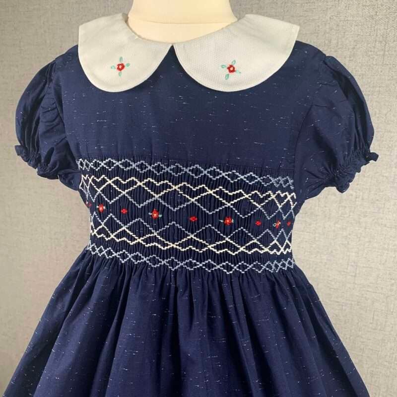 Girls Navy Blue Smocked Dress With White Dotted Print