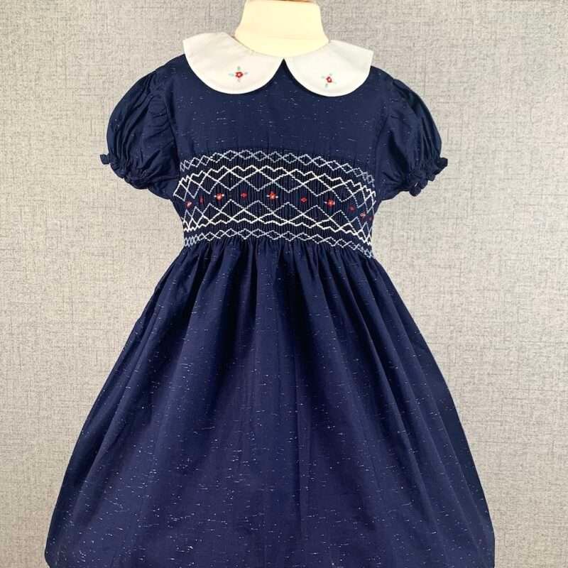 Girls Navy Blue Smocked Dress With White Dotted Print - Image 2